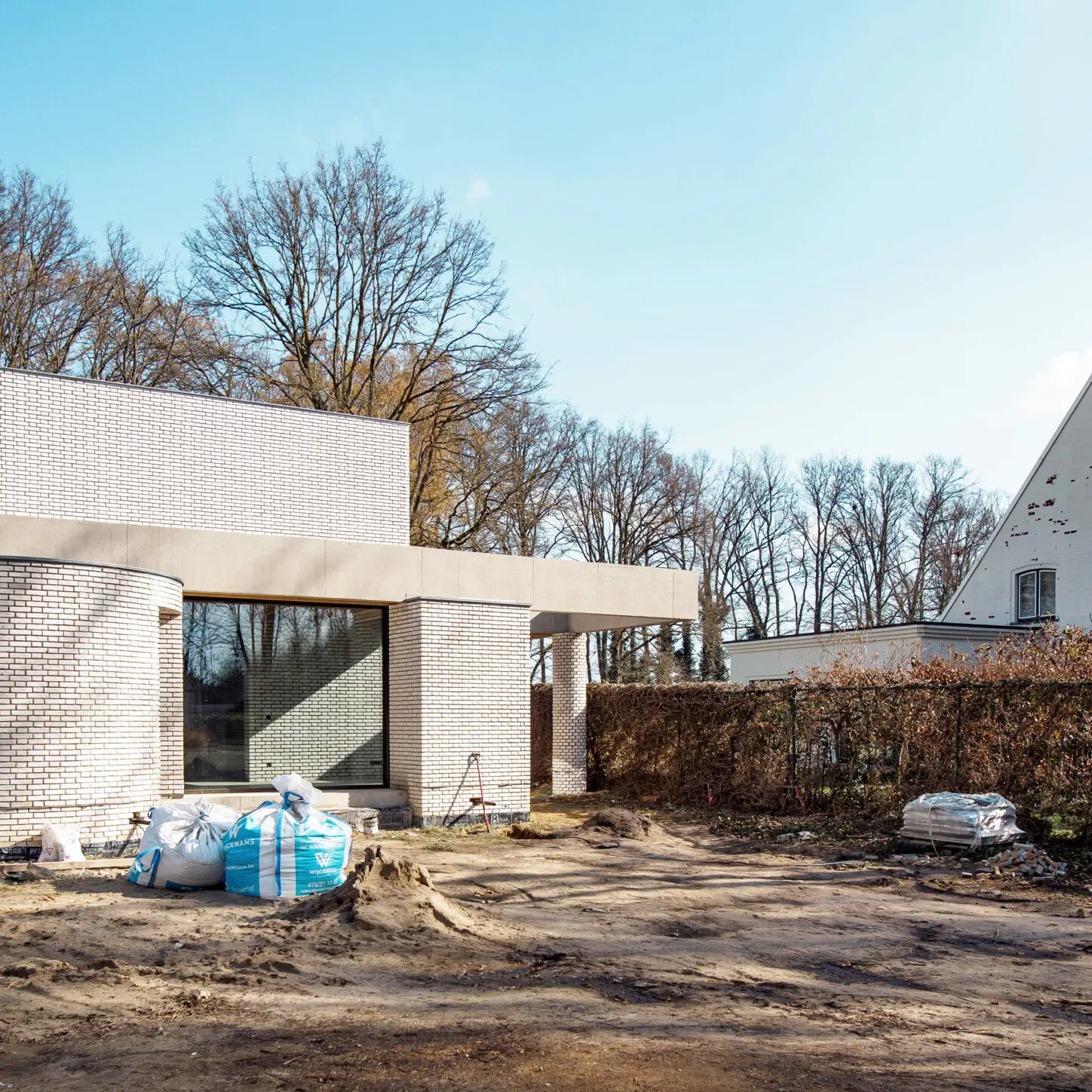 VANDYCK Construction of a single family house, construction site