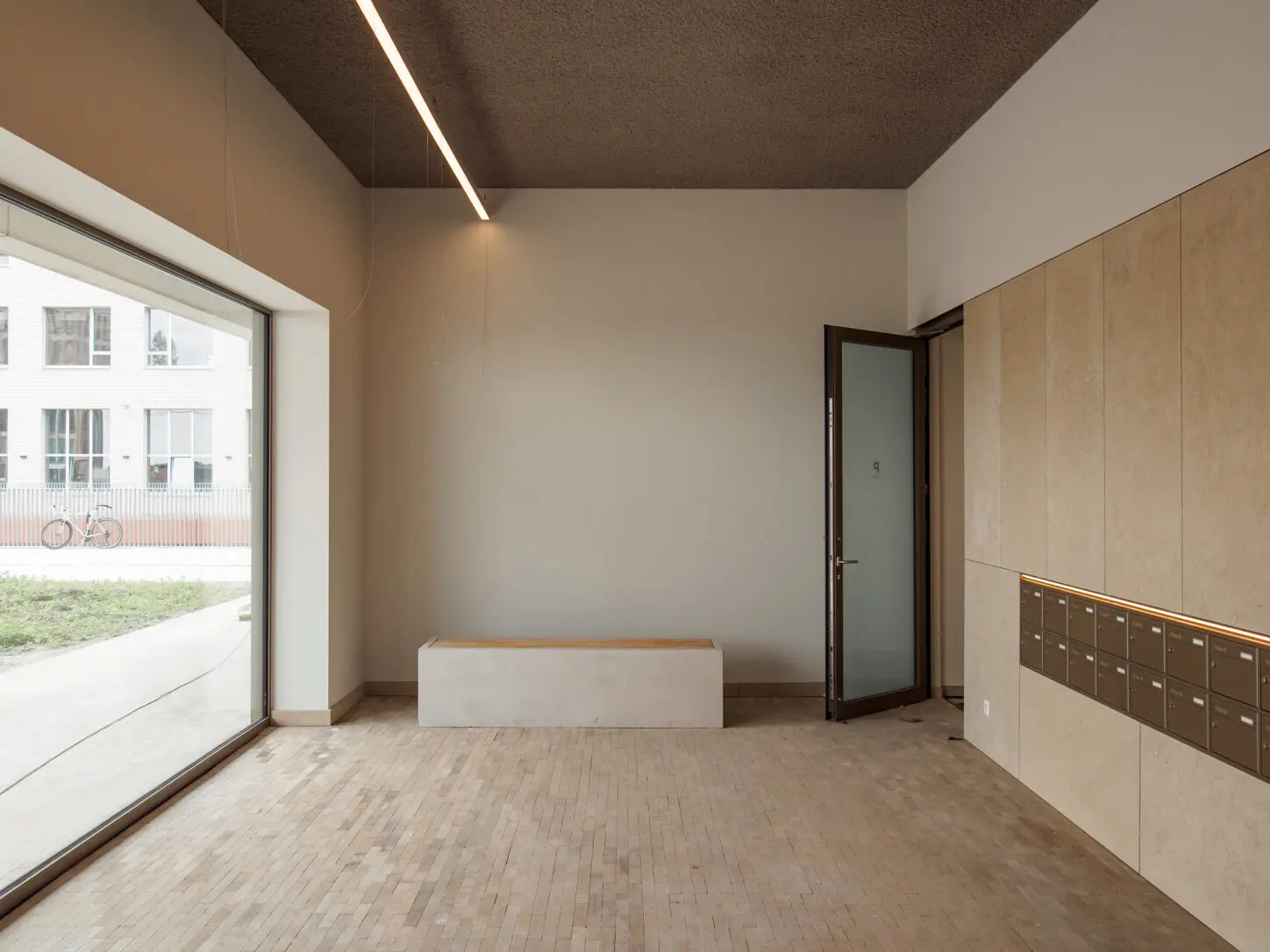 DELEERS Construction of 3 urban villas and productive activities, Photo common entrance with lettre boxes