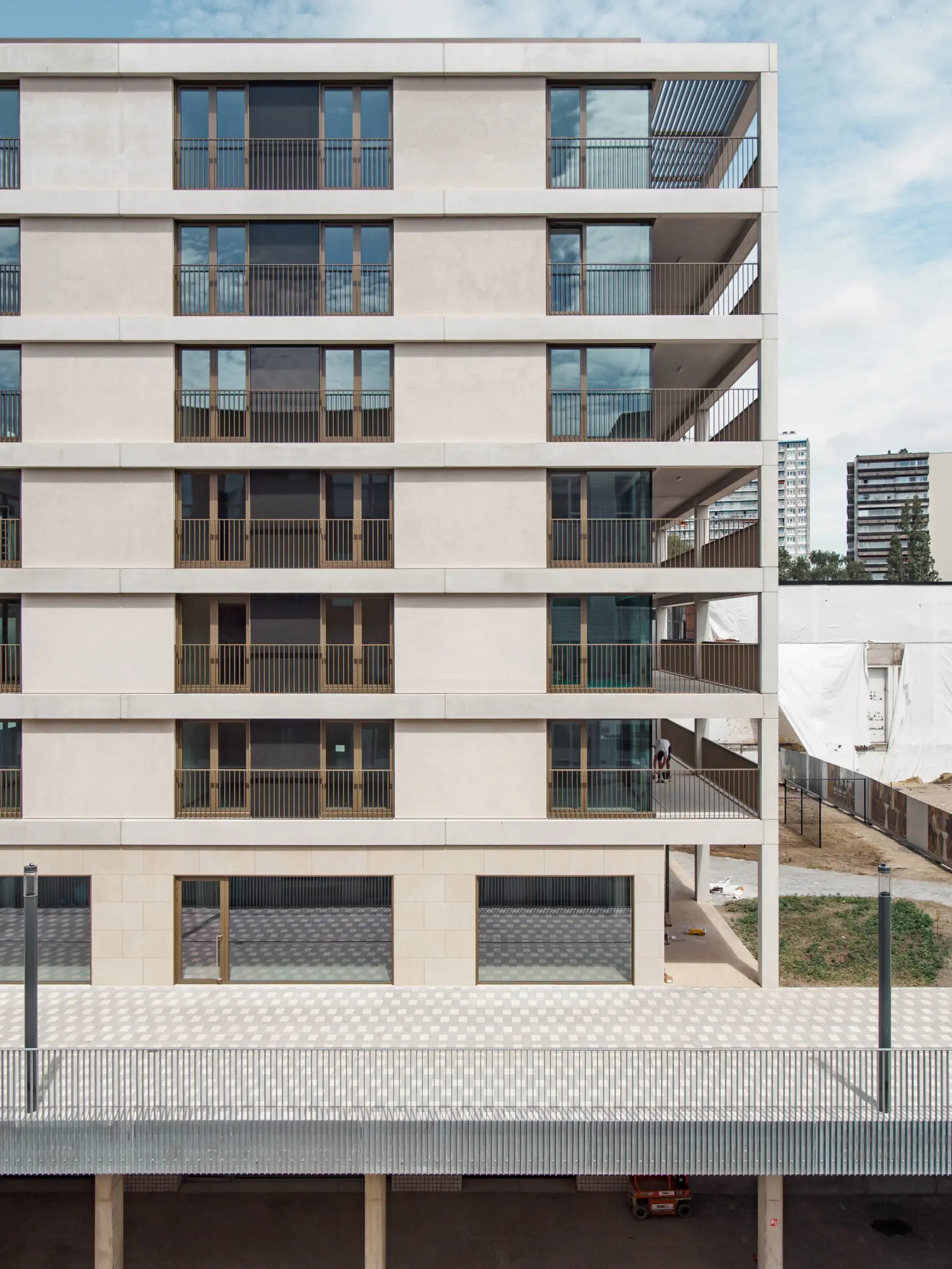 DELEERS Construction of 3 urban villas and productive activities, Photo facade detail with terraces